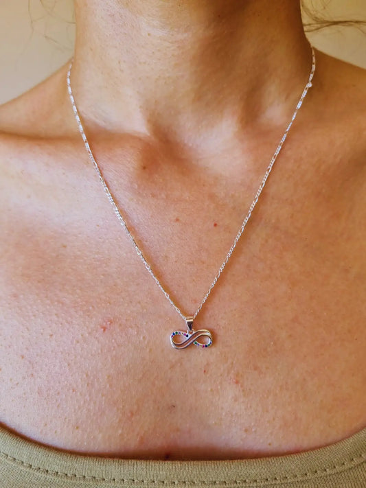 Colgante infinito de plata 925 con puntas de circones de colores